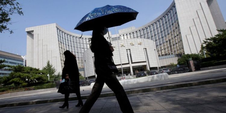 China unexpectedly leaves lending rates steady; markets expect cuts soon