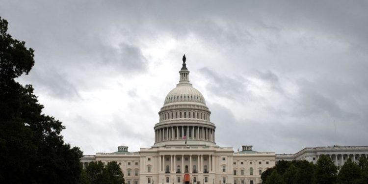 Biden urges Congress to pass short-term spending bill