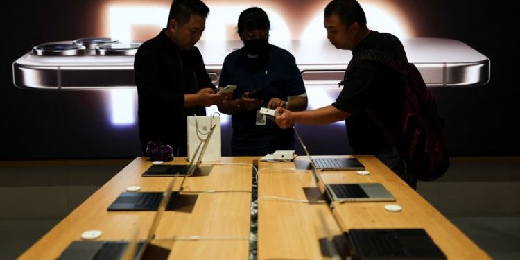 Apple results top Wall Street targets on strong iPhone sales, shares drop on outlook