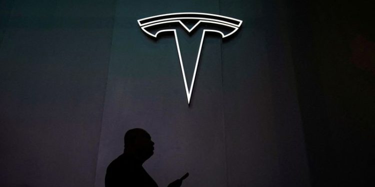 Tesla unveils Cybercab robotaxi, sets 2026 production date
