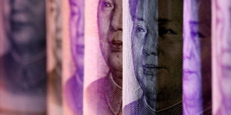 China’s yuan slides to four-month low on Trump’s tariff promise