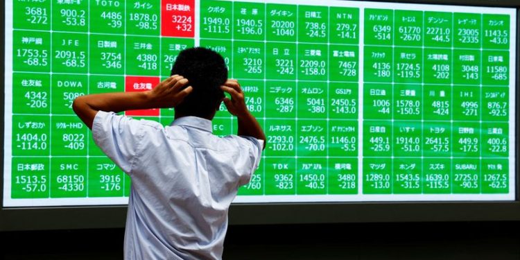 Dollar strong ahead of Fed meeting, Japan auto shares surge on Honda-Nissan news
