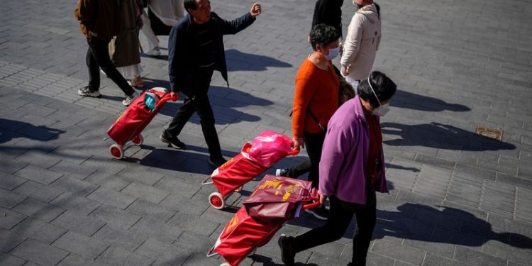 Chinese media hail consumption boost even as caution spurs rentals, not buying