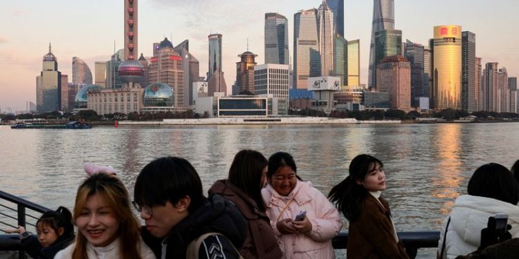 China’s economy beats forecasts in 2024, braces for trade war